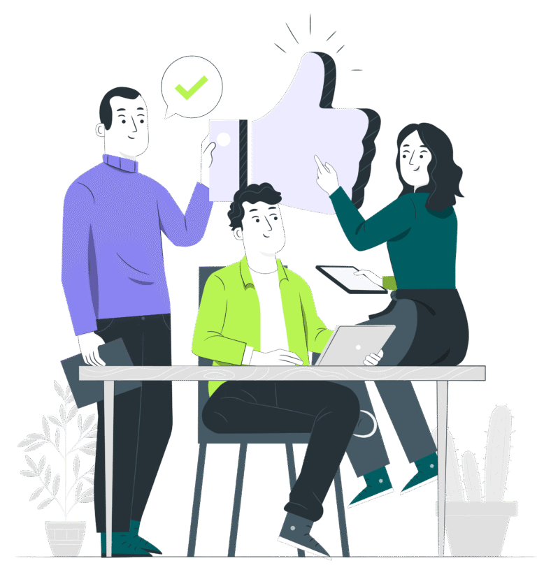 Trois collaborateurs échangent autour d’une table avec ordinateurs et documents, symbolisant la collaboration, la validation d’idées et le travail d’équipe.